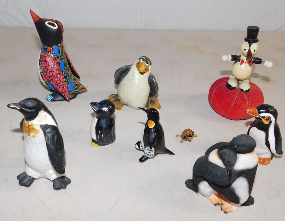 Lot of Hand Painted Penguin Figurines: Lot of Hand Painted Penguin Figurines . "ALL DESCRIPTIONS AND ANY CONDITION STATEMENT GIVEN BY LANGSTON AUCTION GALLERY ARE STRICTLY OPINIONS AND LANGSTON'S SHALL HAVE NO RESPONSIBILITY FOR ERRORS OR 