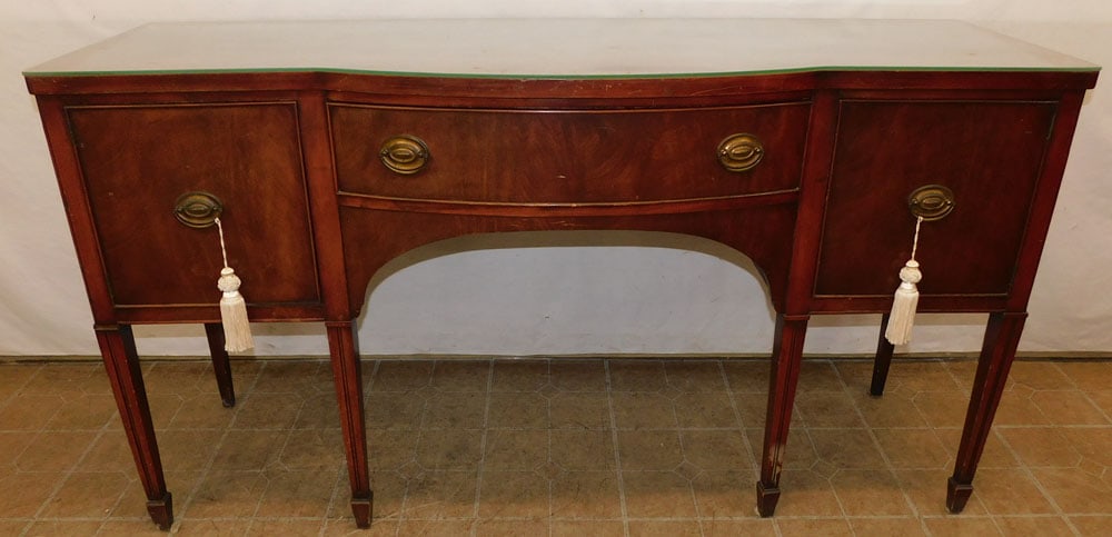 Mahogany Bow Front Sideboard: Mahogany Bow Front Sideboard. 66" W 22 1/2" D 36 1/4" H "ALL DESCRIPTIONS AND ANY CONDITION STATEMENT GIVEN BY LANGSTON AUCTION GALLERY ARE STRICTLY OPINIONS AND LANGSTON'S SHALL HAVE NO RESPONSIBILIT