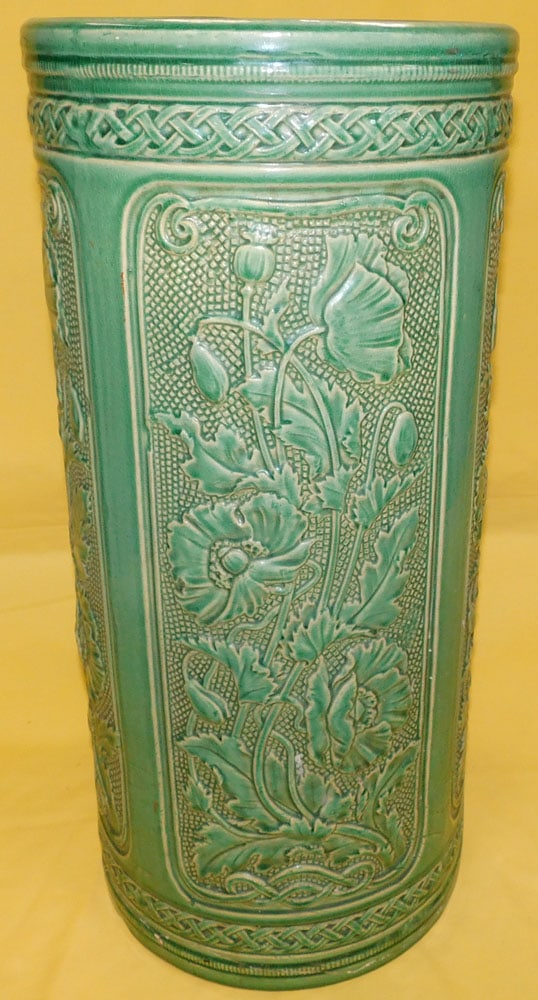 Majolica Style Umbrella Stand ( Hairline In Bottom): Majolica Style Umbrella Stand ( Hairline In Bottom). 22" H "ALL DESCRIPTIONS AND ANY CONDITION STATEMENT GIVEN BY LANGSTON AUCTION GALLERY ARE STRICTLY OPINIONS AND LANGSTON'S SHALL HAVE NO RESPONSIBI
