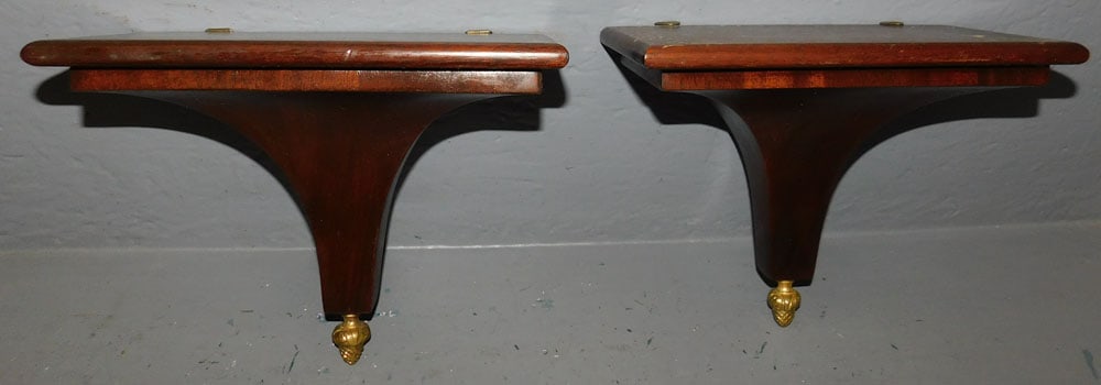 Pair of Mahogany Wall Brackets: Pair of Mahogany Wall Brackets. 10" W 8" H "ALL DESCRIPTIONS AND ANY CONDITION STATEMENT GIVEN BY LANGSTON AUCTION GALLERY ARE STRICTLY OPINIONS AND LANGSTON'S SHALL HAVE NO RESPONSIBILITY FOR ERRORS