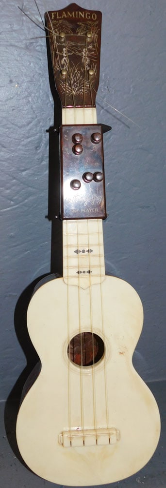 Arthur Godfrey Flamingo Uke Player: Arthur Godfrey Flamingo Uke Player. 20 3/4" Long "ALL DESCRIPTIONS AND ANY CONDITION STATEMENT GIVEN BY LANGSTON AUCTION GALLERY ARE STRICTLY OPINIONS AND LANGSTON'S SHALL HAVE NO RESPONSIBILITY FOR E