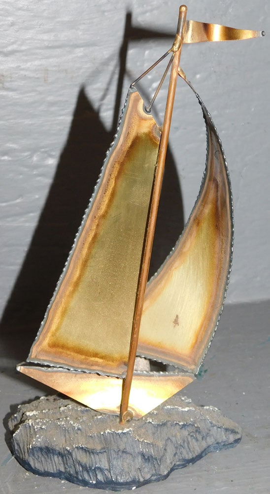 Mid Century Modern Brass Sail Boat Model - Artist Signed: Mid Century Modern Brass Sail Boat Model - Artist Signed. 9" H "ALL DESCRIPTIONS AND ANY CONDITION STATEMENT GIVEN BY LANGSTON AUCTION GALLERY ARE STRICTLY OPINIONS AND LANGSTON'S SHALL HAVE NO RESPON