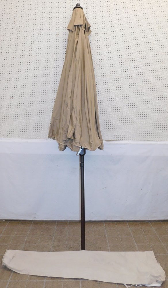 Large Umbrella: Large Umbrella. 70" H "ALL DESCRIPTIONS AND ANY CONDITION STATEMENT GIVEN BY LANGSTON AUCTION GALLERY ARE STRICTLY OPINIONS AND LANGSTON'S SHALL HAVE NO RESPONSIBILITY FOR ERRORS OR OMISSIONS. THE ABS