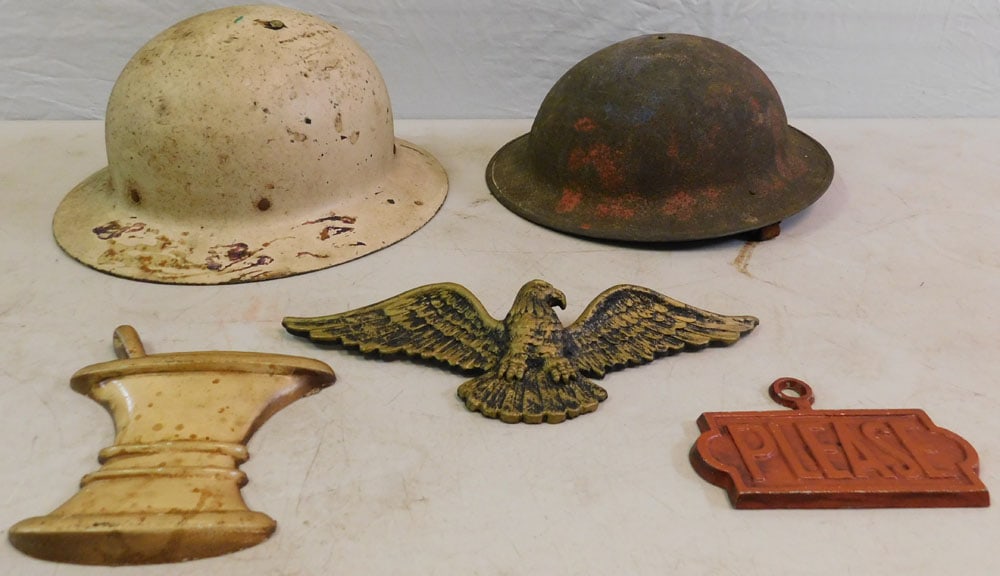 Lot of War Helmets & Metal Wall Hangings: Lot of War Helmets & Metal Wall Hangings. ALL DESCRIPTIONS AND ANY CONDITION STATEMENT GIVEN BY LANGSTON AUCTION GALLERY ARE STRICTLY OPINIONS AND LANGSTON'S SHALL HAVE NO RESPONSIBILITY FOR ERRORS OR