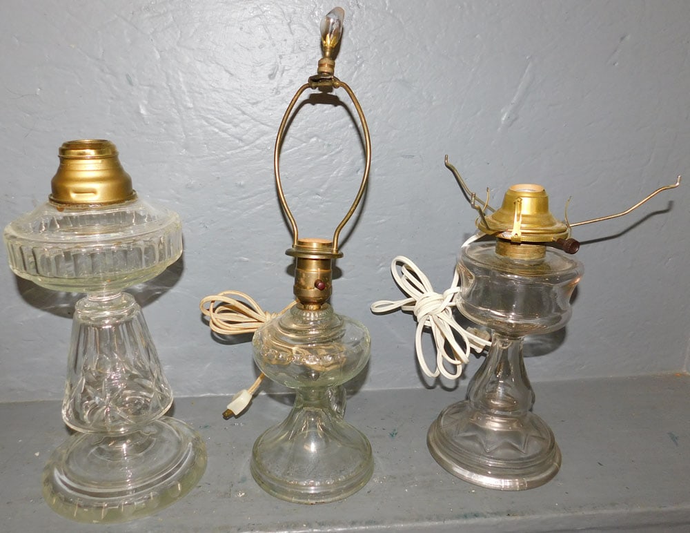 3 Antique Glass Oil Lamps: 3 Antique Glass Oil Lamps. Up to: 16 1/2" H ALL DESCRIPTIONS AND ANY CONDITION STATEMENT GIVEN BY LANGSTON AUCTION GALLERY ARE STRICTLY OPINIONS AND LANGSTON'S SHALL HAVE NO RESPONSIBILITY FOR ERRORS 