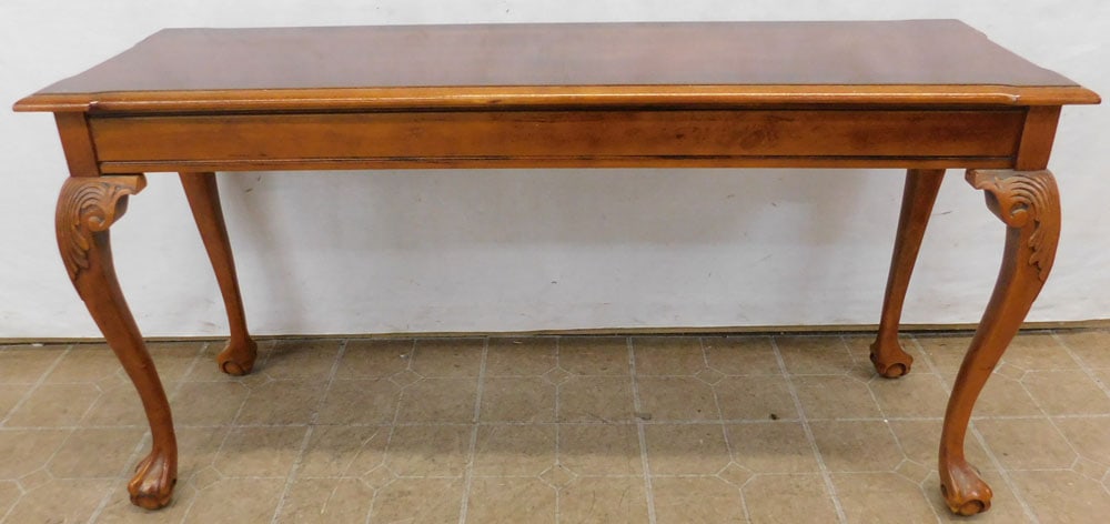 Cherry Banded Top Sofa Table with Claw Feet: Cherry Banded Top Sofa Table with Claw Feet. 54" W 18" D 27 1/4" H ALL DESCRIPTIONS AND ANY CONDITION STATEMENT GIVEN BY LANGSTON AUCTION GALLERY ARE STRICTLY OPINIONS AND LANGSTON'S SHALL HAVE NO RES