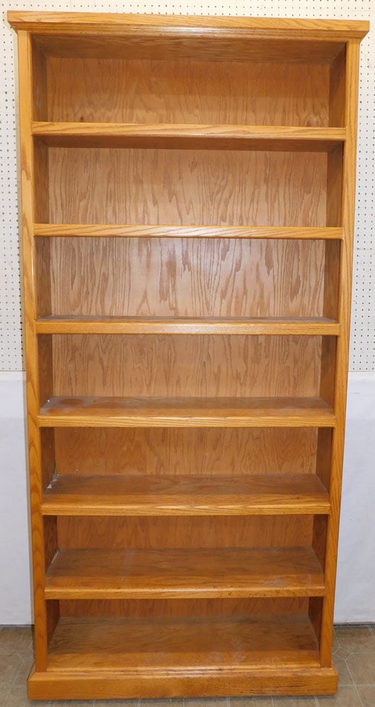 Oak Shelf: Oak Shelf. 41 1/2" W 11 3/4" D 86 1/4" H ALL DESCRIPTIONS AND ANY CONDITION STATEMENT GIVEN BY LANGSTON AUCTION GALLERY ARE STRICTLY OPINIONS AND LANGSTON'S SHALL HAVE NO RESPONSIBILITY FOR ERRORS OR 
