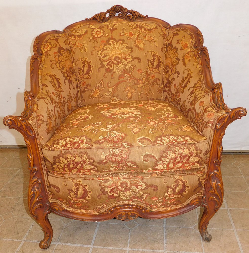 Carved Mahogany French Arm Chair: Carved Mahogany French Arm Chair. 35" H ALL DESCRIPTIONS AND ANY CONDITION STATEMENT GIVEN BY LANGSTON AUCTION GALLERY ARE STRICTLY OPINIONS AND LANGSTON'S SHALL HAVE NO RESPONSIBILITY FOR ERRORS OR O