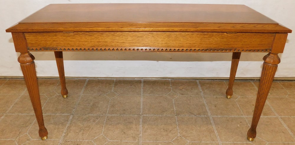 Oak Lift Top Piano Bench with Sheet Music: Oak Lift Top Piano Bench with Sheet Music. 33 3/4" W 13" D 18 1/4" H ALL DESCRIPTIONS AND ANY CONDITION STATEMENT GIVEN BY LANGSTON AUCTION GALLERY ARE STRICTLY OPINIONS AND LANGSTON'S SHALL HAVE NO R