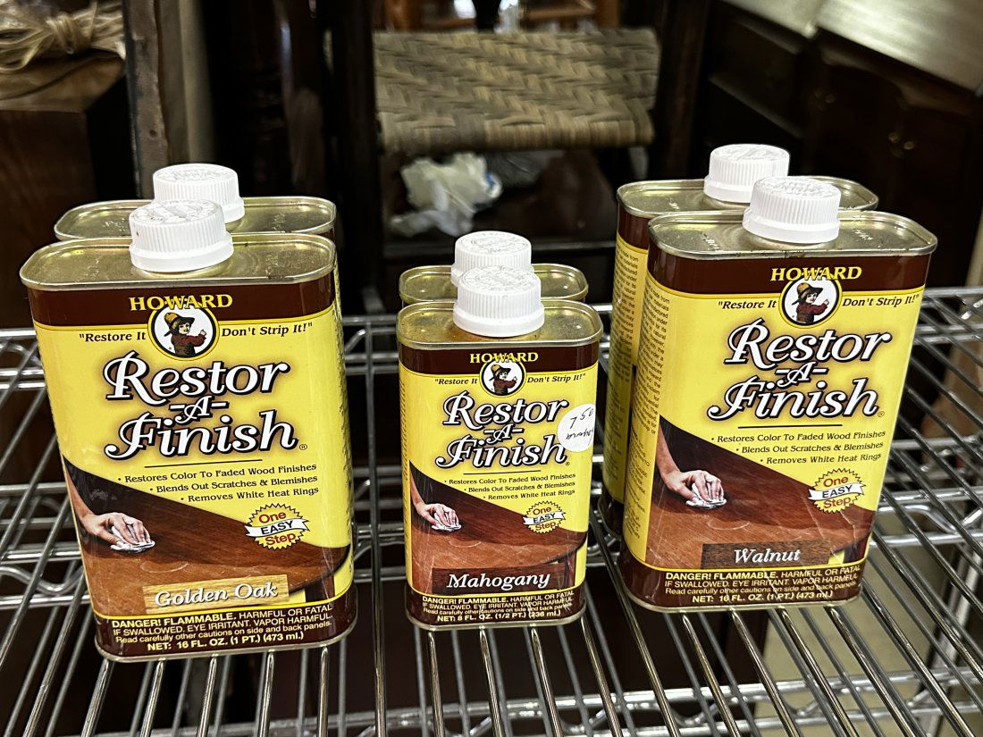 Lot of 6 New Howard Restor-A-Finish: Lot of 6 New Howard Restor-A-Finish. (2) 16 oz. Walnut, (2) 16 oz. Golden Oak, & (2) 8 oz. Mahogany ALL DESCRIPTIONS AND ANY CONDITION STATEMENT GIVEN BY LANGSTON AUCTION GALLERY ARE STRICTLY OPINIONS