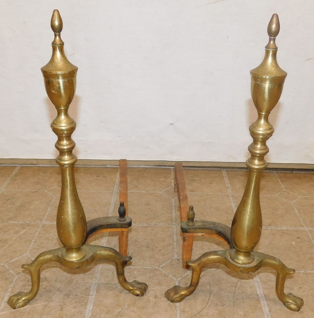 Pair of Brass Andirons: Pair of Brass Andirons. 18 1/2" H ALL DESCRIPTIONS AND ANY CONDITION STATEMENT GIVEN BY LANGSTON AUCTION GALLERY ARE STRICTLY OPINIONS AND LANGSTON'S SHALL HAVE NO RESPONSIBILITY FOR ERRORS OR OMISSIO