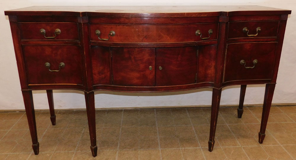 Mahogany Bow Front Sideboard: Mahogany Bow Front Sideboard. 68" W 23" D 39" H ALL DESCRIPTIONS AND ANY CONDITION STATEMENT GIVEN BY LANGSTON AUCTION GALLERY ARE STRICTLY OPINIONS AND LANGSTON'S SHALL HAVE NO RESPONSIBILITY FOR ERR