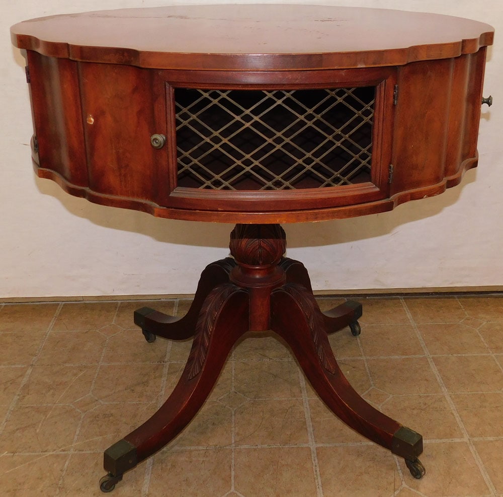 Mahogany Drum Table with 4 Open Brass Fretwork Drawers: Mahogany Drum Table with 4 Open Brass Fretwork Drawers. 32" Dia. 30 1/2" H ALL DESCRIPTIONS AND ANY CONDITION STATEMENT GIVEN BY LANGSTON AUCTION GALLERY ARE STRICTLY OPINIONS AND LANGSTON'S SHALL HAV