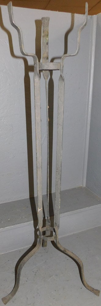 Wrought Iron Stand: Wrought Iron Stand . 39" H ALL DESCRIPTIONS AND ANY CONDITION STATEMENT GIVEN BY LANGSTON AUCTION GALLERY ARE STRICTLY OPINIONS AND LANGSTON'S SHALL HAVE NO RESPONSIBILITY FOR ERRORS OR OMISSIONS. THE