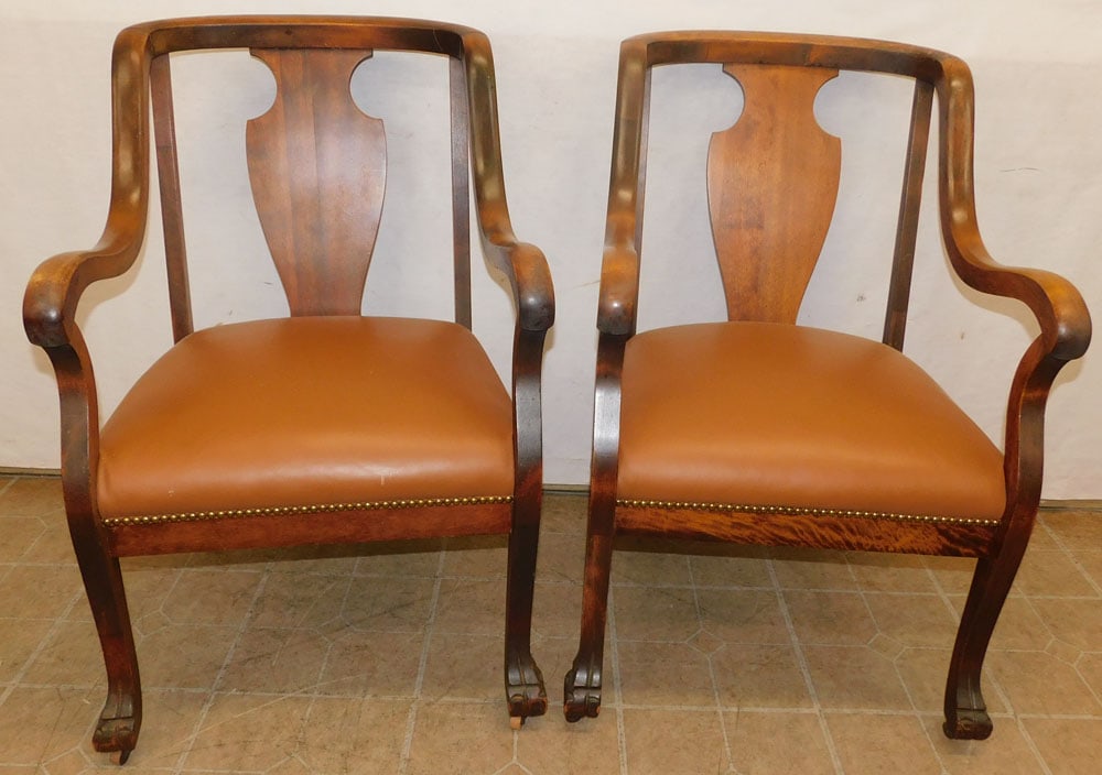 Pair of Antique Mahogany Arm Chairs with Leather Seats: Pair of Antique Mahogany Arm Chairs with Leather Seats . 36 1/2" H ALL DESCRIPTIONS AND ANY CONDITION STATEMENT GIVEN BY LANGSTON AUCTION GALLERY ARE STRICTLY OPINIONS AND LANGSTON'S SHALL HAVE NO RES