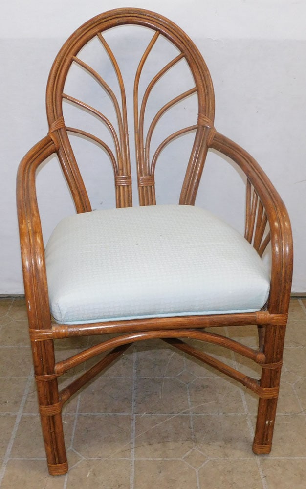 Rattan Arm Chair: Rattan Arm Chair. 39" H ALL DESCRIPTIONS AND ANY CONDITION STATEMENT GIVEN BY LANGSTON AUCTION GALLERY ARE STRICTLY OPINIONS AND LANGSTON'S SHALL HAVE NO RESPONSIBILITY FOR ERRORS OR OMISSIONS. THE AB