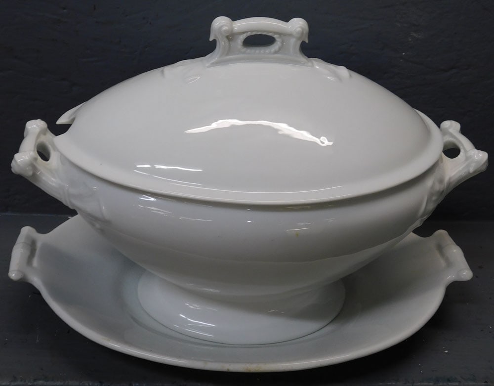Ironstone Porcelain Tureen with Underplate: Ironstone Porcelain Tureen with Underplate. 15" W 10 1/2" H ALL DESCRIPTIONS AND ANY CONDITION STATEMENT GIVEN BY LANGSTON AUCTION GALLERY ARE STRICTLY OPINIONS AND LANGSTON'S SHALL HAVE NO RESPONSIBI