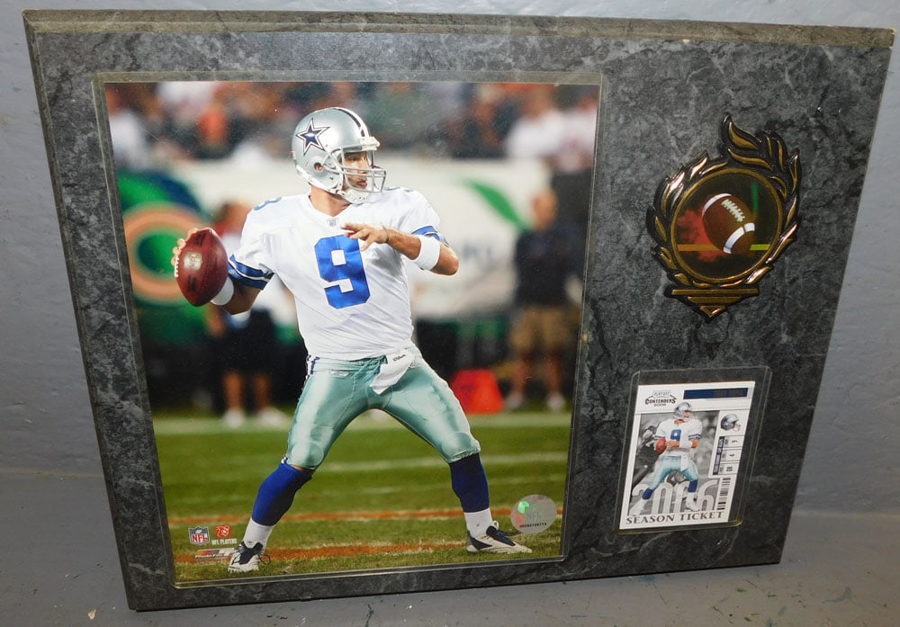 Framed Tony Romo Dallas QB Photo & Season Card Ticket: Framed Tony Romo Dallas QB Photo & Season Card Ticket . 15" x 12" ALL DESCRIPTIONS AND ANY CONDITION STATEMENT GIVEN BY LANGSTON AUCTION GALLERY ARE STRICTLY OPINIONS AND LANGSTON'S SHALL HAVE NO RESP