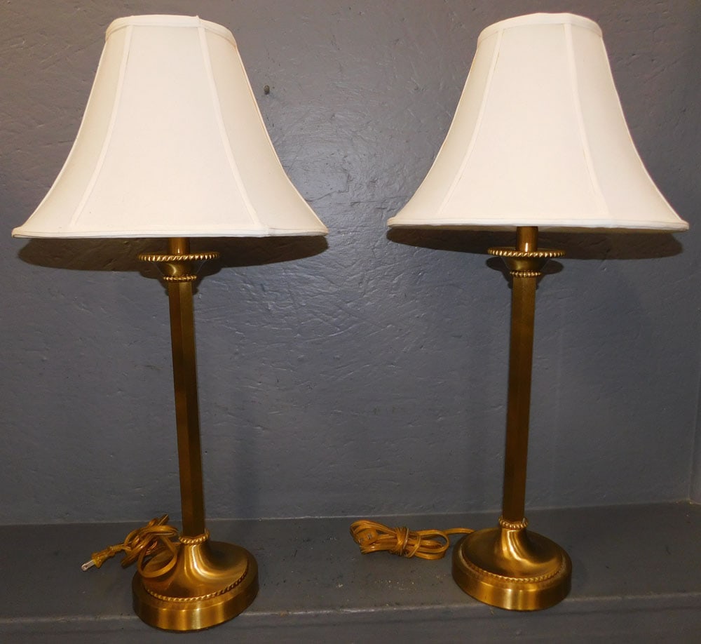Pair of Brass Candlestick Lamps: Pair of Brass Candlestick Lamps. 26 1/2" H ALL DESCRIPTIONS AND ANY CONDITION STATEMENT GIVEN BY LANGSTON AUCTION GALLERY ARE STRICTLY OPINIONS AND LANGSTON'S SHALL HAVE NO RESPONSIBILITY FOR ERRORS O