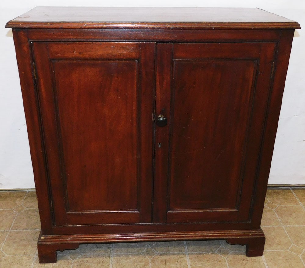 19th Century Mahogany 2 Door Cabinet: 19th Century Mahogany 2 Door Cabinet . 34 3/4" W 15 3/4" D 36" H ALL DESCRIPTIONS AND ANY CONDITION STATEMENT GIVEN BY LANGSTON AUCTION GALLERY ARE STRICTLY OPINIONS AND LANGSTON'S SHALL HAVE NO RESPO