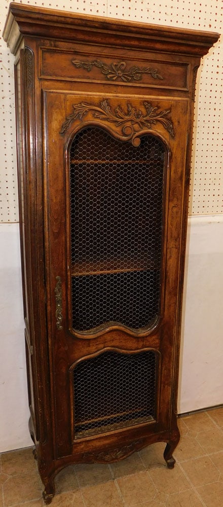 Carved Walnut French Provincial Wire Mesh 1 Door Cabinet: Carved Walnut French Provincial Wire Mesh 1 Door Cabinet . 26 1/2" W 13 1/2" D 69 3/4" H ALL DESCRIPTIONS AND ANY CONDITION STATEMENT GIVEN BY LANGSTON AUCTION GALLERY ARE STRICTLY OPINIONS AND LANGST