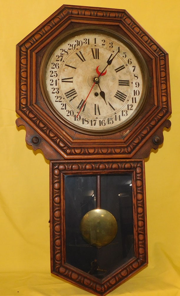Antique Carved Oak Calendar Dial New Haven Regulator: Antique Carved Oak Calendar Dial New Haven Regulator. 33 1/2" L ALL DESCRIPTIONS AND ANY CONDITION STATEMENT GIVEN BY LANGSTON AUCTION GALLERY ARE STRICTLY OPINIONS AND LANGSTON'S SHALL HAVE NO RESPON
