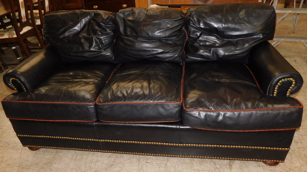 Leather Sofa by Hickory Chair: Leather Sofa by Hickory Chair. 76" L 38" D 33" H ALL DESCRIPTIONS AND ANY CONDITION STATEMENT GIVEN BY LANGSTON AUCTION GALLERY ARE STRICTLY OPINIONS AND LANGSTON'S SHALL HAVE NO RESPONSIBILITY FOR ER
