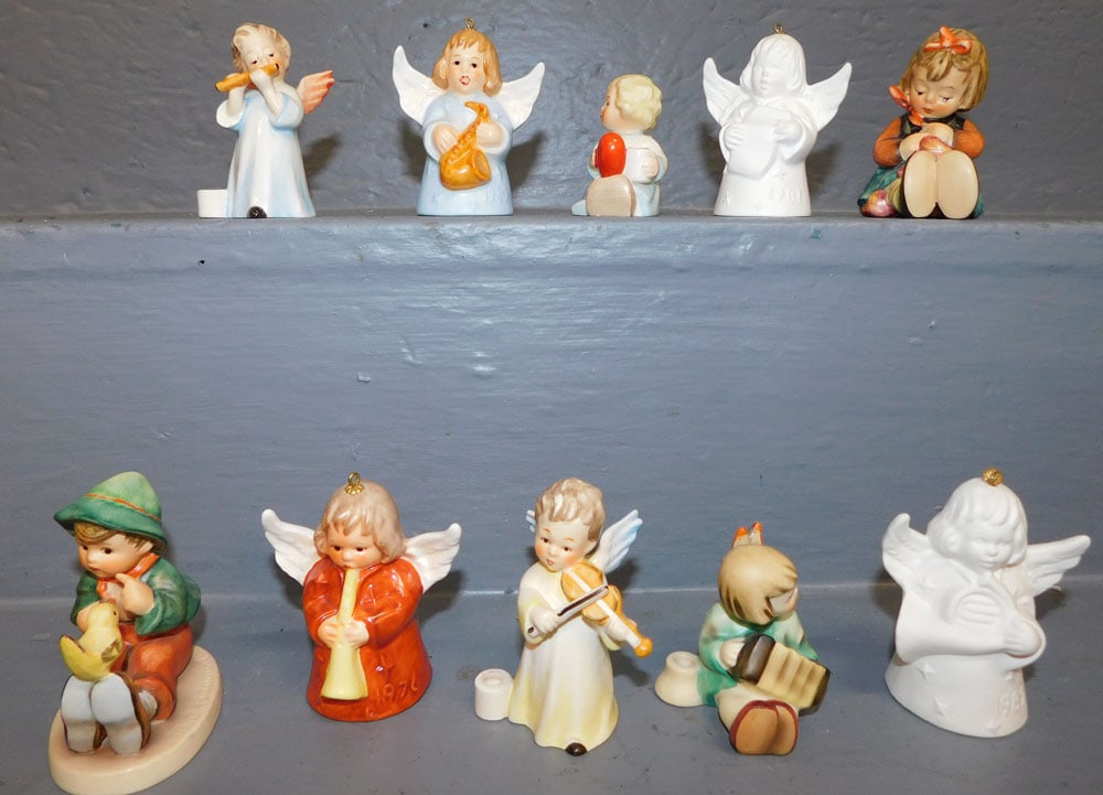 10 Hummel Figurines: 10 Hummel Figurines. ALL DESCRIPTIONS AND ANY CONDITION STATEMENT GIVEN BY LANGSTON AUCTION GALLERY ARE STRICTLY OPINIONS AND LANGSTON'S SHALL HAVE NO RESPONSIBILITY FOR ERRORS OR OMISSIONS. THE ABSEN