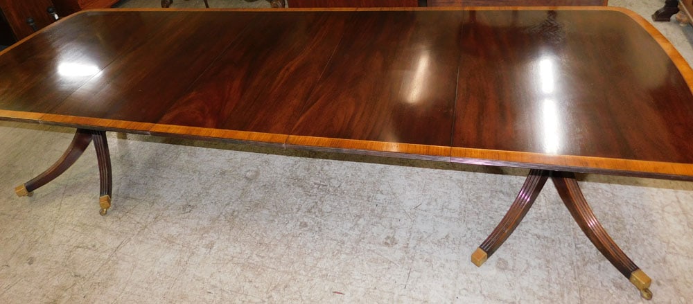 Mahogany Rosewood Banded Top 2 Pedestal Dining Table With 3 Leaves: Mahogany Rosewood Banded Top 2 Pedestal Dining Table With 3 Leaves. 132 3/4" L 44" D 29 3/4" H ALL DESCRIPTIONS AND ANY CONDITION STATEMENT GIVEN BY LANGSTON AUCTION GALLERY ARE STRICTLY OPINIONS AND 
