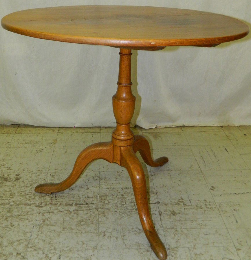 18th c. Queen Anne elm tilt top table.: 18th century Queen Anne elm tilt top table. 31" diameter x 30 5/8" with the grain.