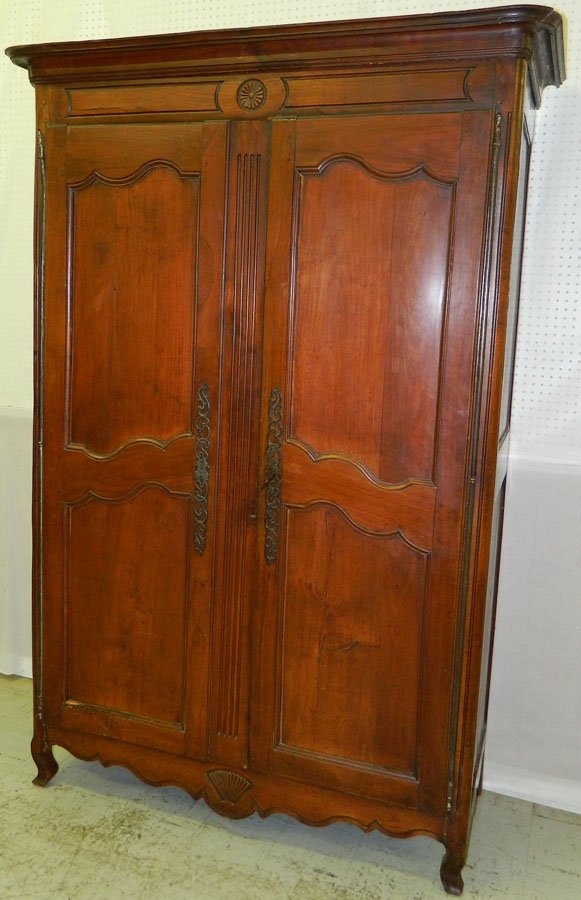 18th c. armoire or linen press with orig. hardware: 18th century French cherry carved armoire or linen press with original hardware. 58 1/2" wide x 24" deep x 87" tall.
