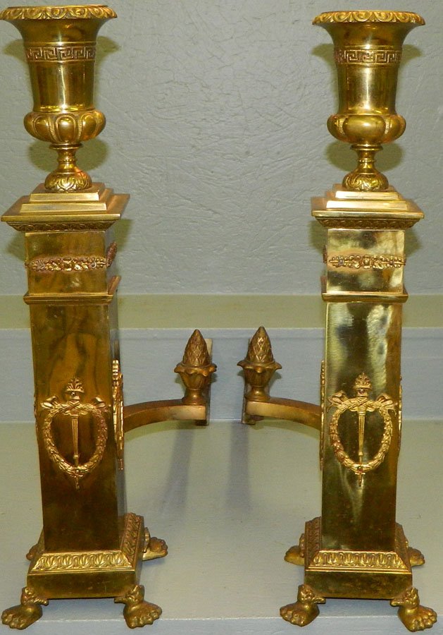 Pair of column brass andirons. 24" tall.: Pair of column brass andirons. 24" tall.