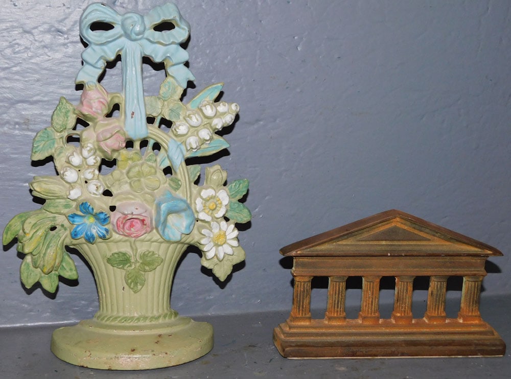 2 painted cast iron door stops: 2 painted cast iron door stops . Up to 10 1/2" H ALL DESCRIPTIONS AND ANY CONDITION STATEMENT GIVEN BY LANGSTON AUCTION GALLERY ARE STRICTLY OPINIONS AND LANGSTON'S SHALL HAVE NO RESPONSIBILITY FOR ER
