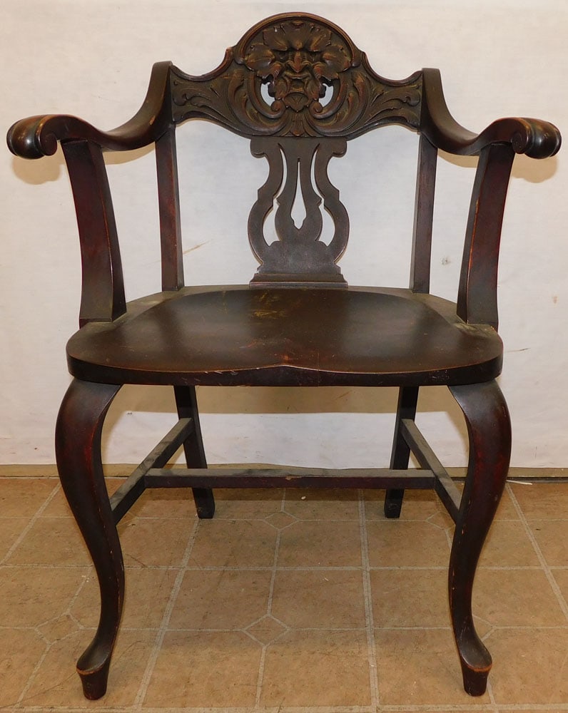 Mahogany Carved Northwind Face Back Arm Chair: Mahogany Carved Northwind Face Back Arm Chair . 35 1/4" H ALL DESCRIPTIONS AND ANY CONDITION STATEMENT GIVEN BY LANGSTON AUCTION GALLERY ARE STRICTLY OPINIONS AND LANGSTON'S SHALL HAVE NO RESPONSIBILI