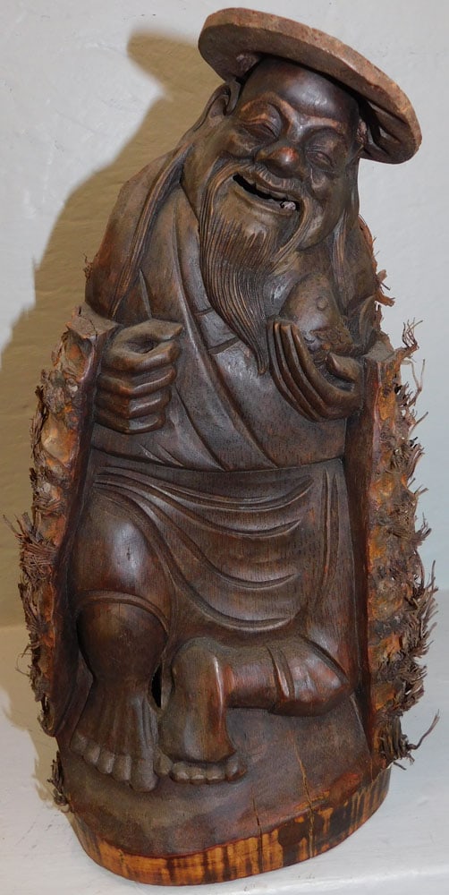 Carved Bamboo Buddha: Carved Bamboo Buddha. 13" H ALL DESCRIPTIONS AND ANY CONDITION STATEMENT GIVEN BY LANGSTON AUCTION GALLERY ARE STRICTLY OPINIONS AND LANGSTON'S SHALL HAVE NO RESPONSIBILITY FOR ERRORS OR OMISSIONS. TH