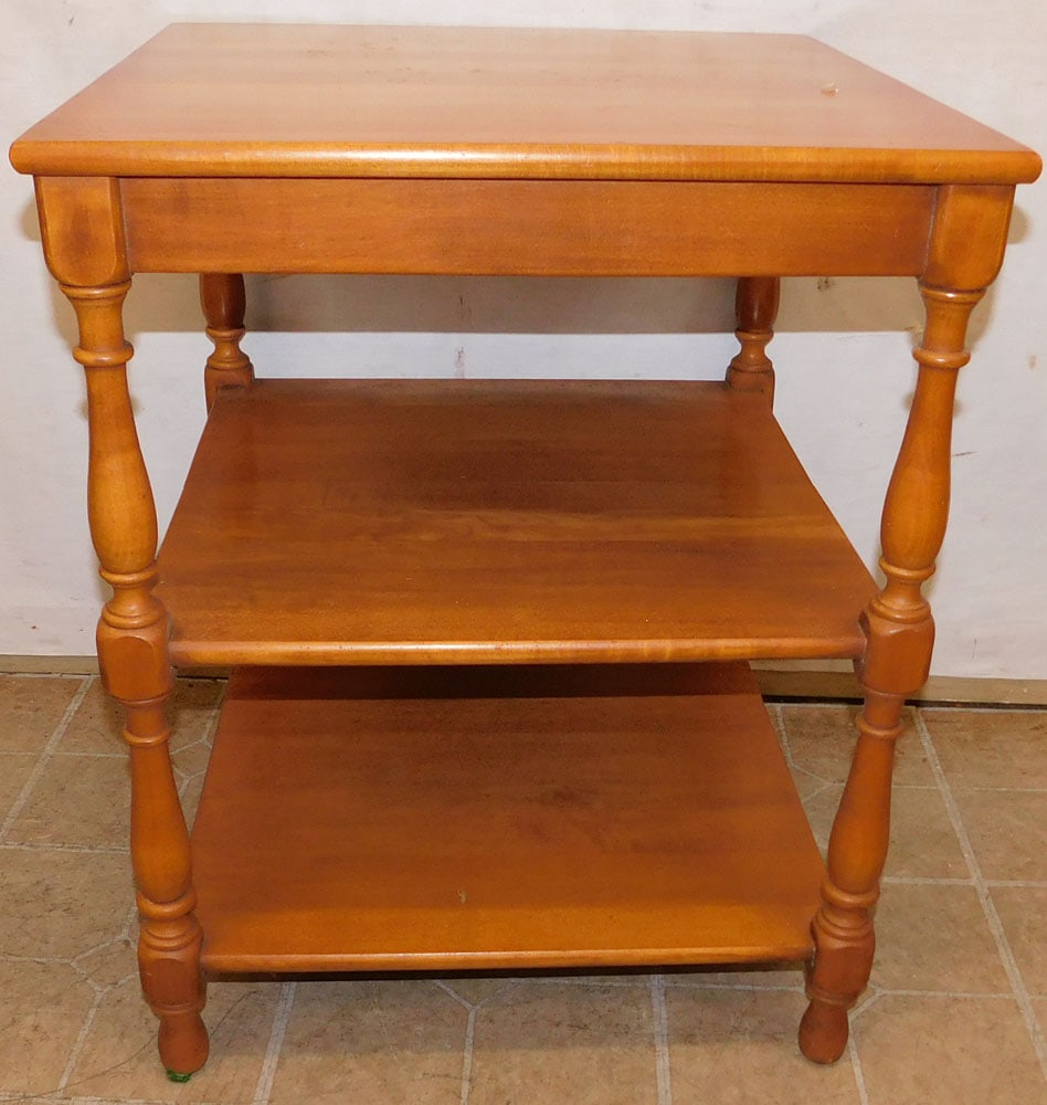 Maple 3 Tier Stand: Maple 3 Tier Stand . 22" Dia. 27 1/4" H ALL DESCRIPTIONS AND ANY CONDITION STATEMENT GIVEN BY LANGSTON AUCTION GALLERY ARE STRICTLY OPINIONS AND LANGSTON'S SHALL HAVE NO RESPONSIBILITY FOR ERRORS OR O