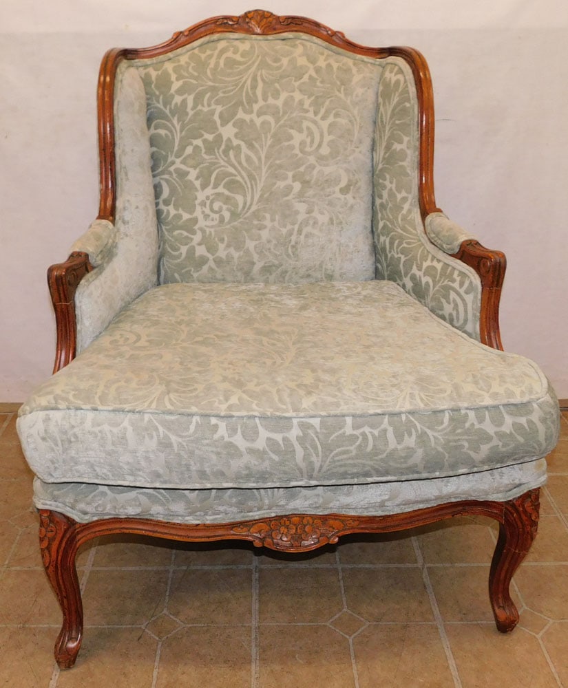 Carved Walnut & Upholstered French Arm Chair: Carved Walnut & Upholstered French Arm Chair. 37 1/2" H ALL DESCRIPTIONS AND ANY CONDITION STATEMENT GIVEN BY LANGSTON AUCTION GALLERY ARE STRICTLY OPINIONS AND LANGSTON'S SHALL HAVE NO RESPONSIBILITY