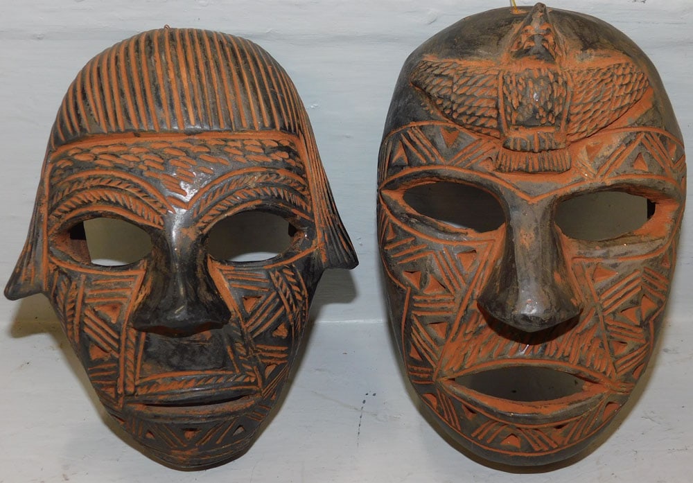 2 Clay Masks: 2 Clay Masks. Up to 6 1/2" x 4 1/4" ALL DESCRIPTIONS AND ANY CONDITION STATEMENT GIVEN BY LANGSTON AUCTION GALLERY ARE STRICTLY OPINIONS AND LANGSTON'S SHALL HAVE NO RESPONSIBILITY FOR ERRORS OR OMISS