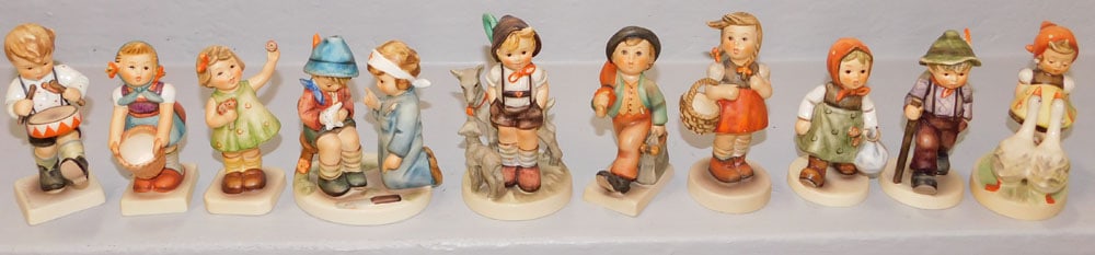 10 Hummel Figurines: 10 Hummel Figurines. Up to 4 1/2" H ALL DESCRIPTIONS AND ANY CONDITION STATEMENT GIVEN BY LANGSTON AUCTION GALLERY ARE STRICTLY OPINIONS AND LANGSTON'S SHALL HAVE NO RESPONSIBILITY FOR ERRORS OR OMISS