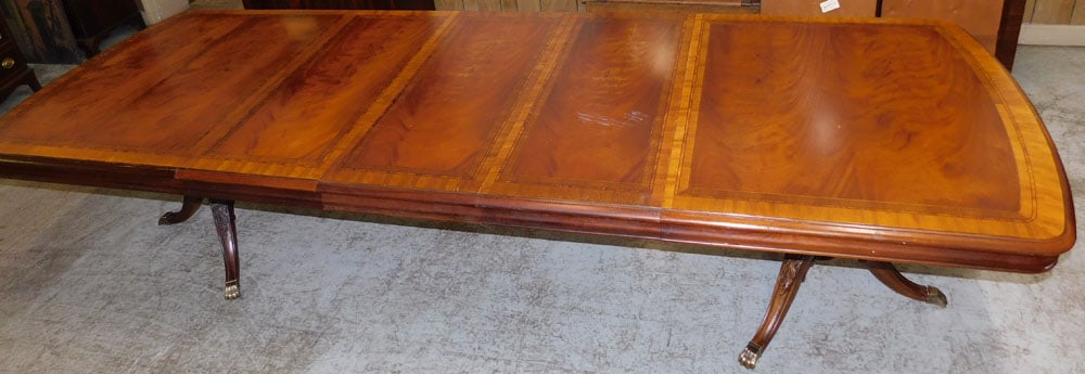 Mahogany Inlaid 2 Pedestal Dining Table with 3 Leaves by Thomasville: Mahogany Inlaid 2 Pedestal Dining Table with 3 Leaves by Thomasville . 130 1/2" L 45 3/4" D 29 3/4" H ALL DESCRIPTIONS AND ANY CONDITION STATEMENT GIVEN BY LANGSTON AUCTION GALLERY ARE STRICTLY OPINIO