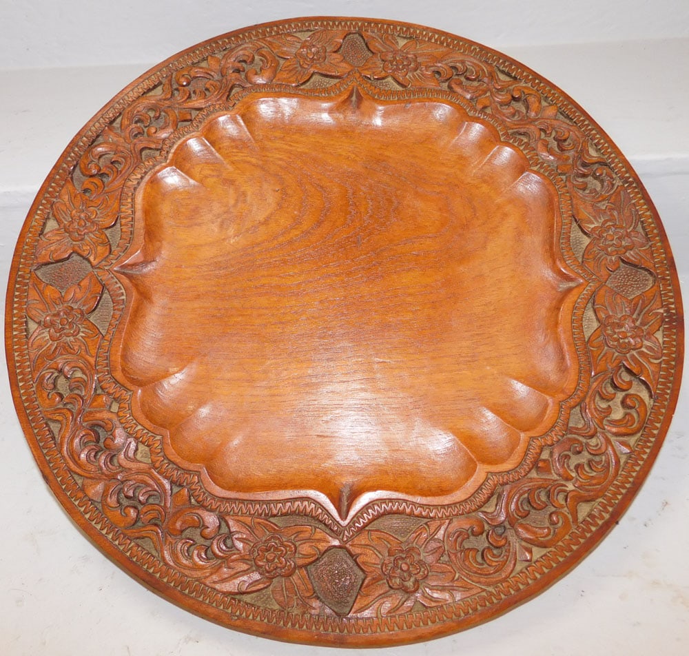 Round Teak Wood Oriental High Relief Carved Tray: Round Teak Wood Oriental High Relief Carved Tray. 19 3/4" Dia. ALL DESCRIPTIONS AND ANY CONDITION STATEMENT GIVEN BY LANGSTON AUCTION GALLERY ARE STRICTLY OPINIONS AND LANGSTON'S SHALL HAVE NO RESPONS