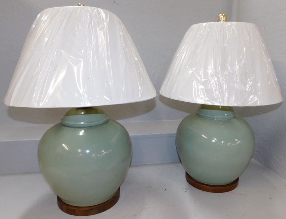 Pair of Celadon Porcelain Lamps by Ralph Lauren: Pair of Celadon Porcelain Lamps by Ralph Lauren. 25 1/2" H ALL DESCRIPTIONS AND ANY CONDITION STATEMENT GIVEN BY LANGSTON AUCTION GALLERY ARE STRICTLY OPINIONS AND LANGSTON'S SHALL HAVE NO RESPONSIBIL