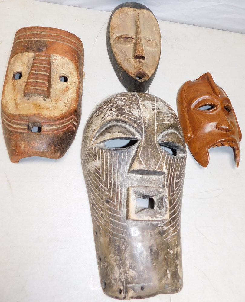 Lot of Carved Wood Masks: Lot of Carved Wood Masks. "ALL DESCRIPTIONS AND ANY CONDITION STATEMENT GIVEN BY LANGSTON AUCTION GALLERY ARE STRICTLY OPINIONS AND LANGSTON'S SHALL HAVE NO RESPONSIBILITY FOR ERRORS OR OMISSIONS. THE