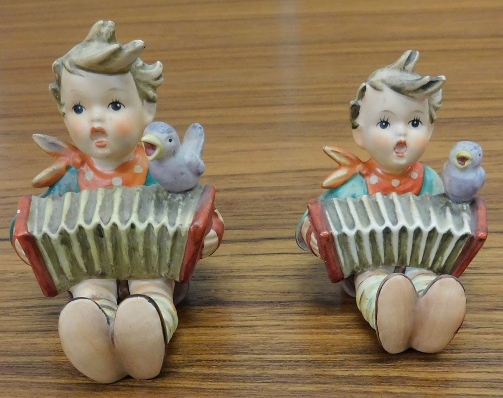 2 Hummel Figurines: 2 Hummel Figurines. Up to 3 3/4" H "ALL DESCRIPTIONS AND ANY CONDITION STATEMENT GIVEN BY LANGSTON AUCTION GALLERY ARE STRICTLY OPINIONS AND LANGSTON'S SHALL HAVE NO RESPONSIBILITY FOR ERRORS OR OMISS