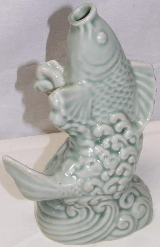 Celadon Open Mouth Koi Fish Sculpture Vase: Celadon Open Mouth Koi Fish Sculpture Vase. 8 1/2" H "ALL DESCRIPTIONS AND ANY CONDITION STATEMENT GIVEN BY LANGSTON AUCTION GALLERY ARE STRICTLY OPINIONS AND LANGSTON'S SHALL HAVE NO RESPONSIBILITY F
