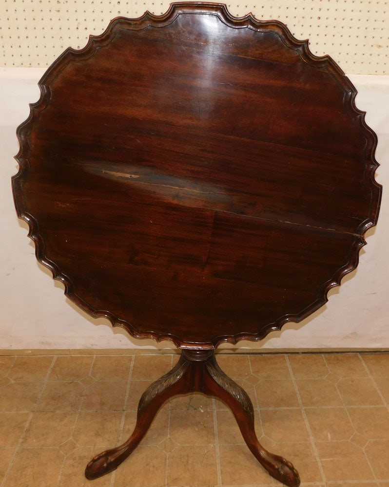 19th century mahogany pie crust top tea table: 19th century mahogany pie crust top tea table. 35 1/4" Dia. 30 1/2" H "ALL DESCRIPTIONS AND ANY CONDITION STATEMENT GIVEN BY LANGSTON AUCTION GALLERY ARE STRICTLY OPINIONS AND LANGSTON'S SHALL HAVE NO
