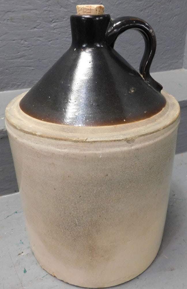 antique stone ware whiskey jug: antique stone ware whiskey jug. 14"H "ALL DESCRIPTIONS AND ANY CONDITION STATEMENT GIVEN BY LANGSTON AUCTION GALLERY ARE STRICTLY OPINIONS AND LANGSTON'S SHALL HAVE NO RESPONSIBILITY FOR ERRORS OR OMI
