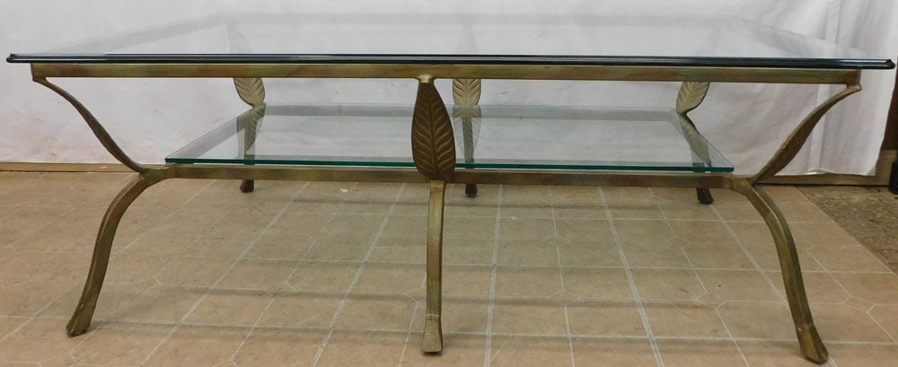 painted metal and glass top coffee table: painted metal and glass top coffee table. 57 1/4" W 35 1/4" D 21 1/4" H "ALL DESCRIPTIONS AND ANY CONDITION STATEMENT GIVEN BY LANGSTON AUCTION GALLERY ARE STRICTLY OPINIONS AND LANGSTON'S SHALL HAVE 