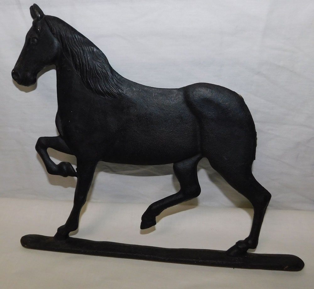 cast iron horse door stop: cast iron horse door stop. "ALL DESCRIPTIONS AND ANY CONDITION STATEMENT GIVEN BY LANGSTON AUCTION GALLERY ARE STRICTLY OPINIONS AND LANGSTON'S SHALL HAVE NO RESPONSIBILITY FOR ERRORS OR OMISSIONS. TH