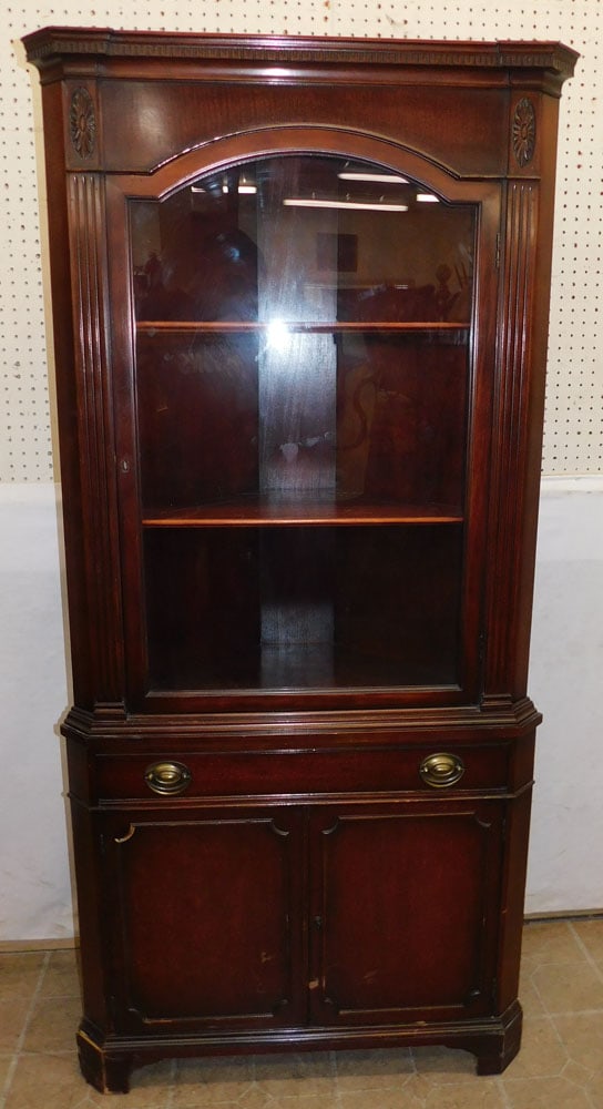 mahogany glass door corner cabinet: mahogany glass door corner cabinet. 33" W 16" D 70 1/4" H "ALL DESCRIPTIONS AND ANY CONDITION STATEMENT GIVEN BY LANGSTON AUCTION GALLERY ARE STRICTLY OPINIONS AND LANGSTON'S SHALL HAVE NO RESPONSIBIL